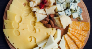 How does regular consumption of cheese benefit the body?