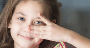 Why are children more likely to suffer from dry eye syndrome?