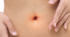 What disease can belly button pain indicate?
